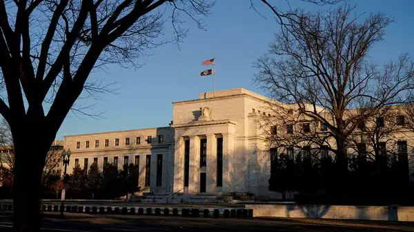 Fed flags end of rate hikes, sees lower borrowing costs in 2024